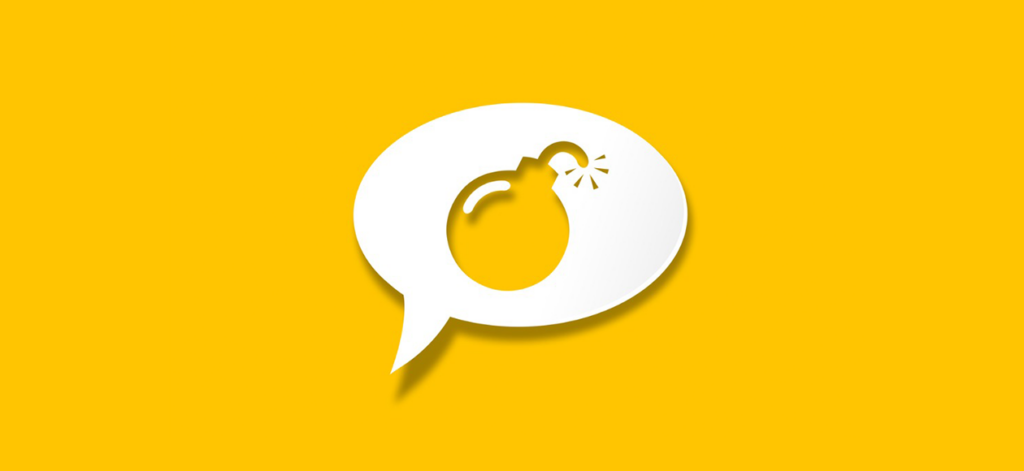 White paper "chat" bubble on a yellow background with a bomb icon cut into it.